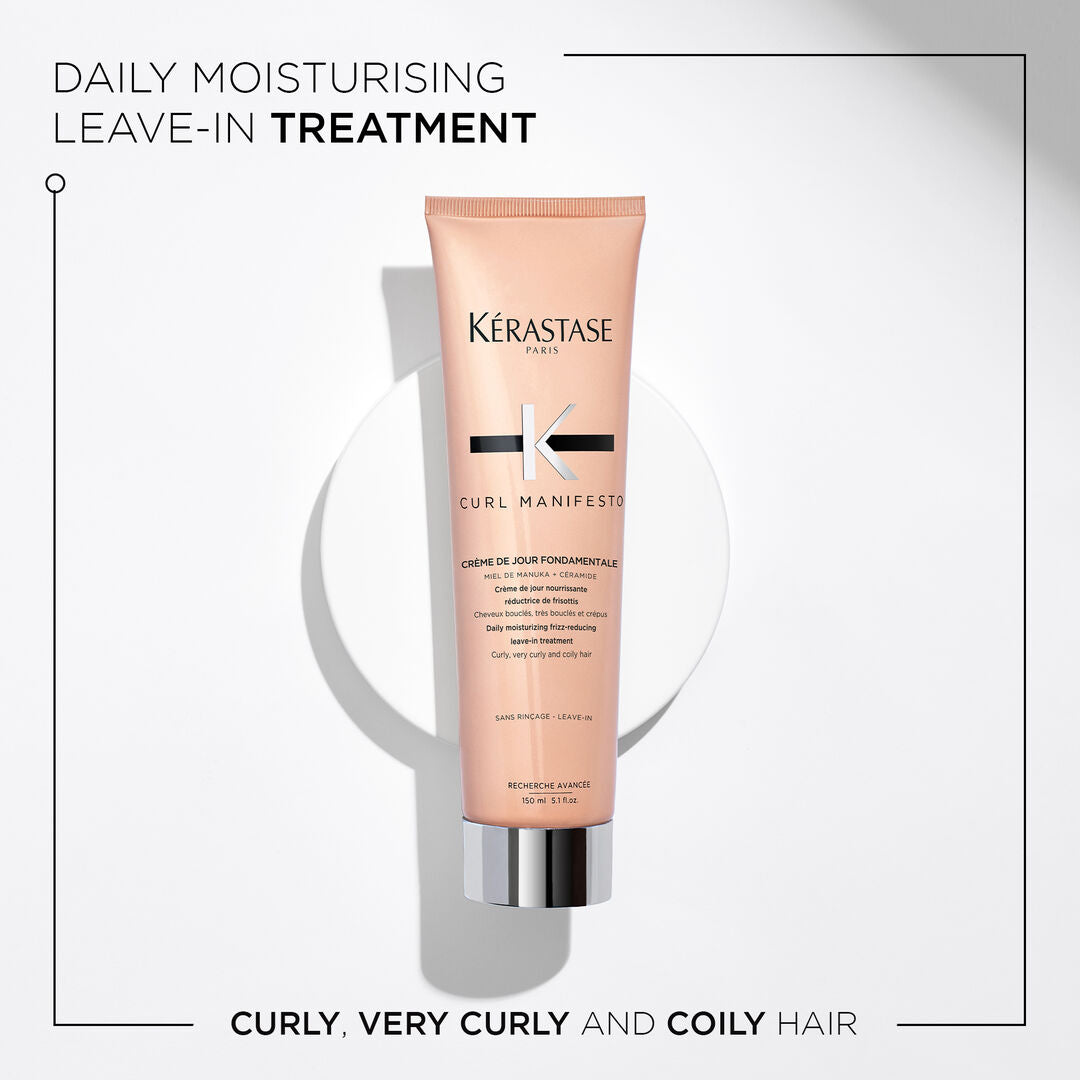 A tube of Kerestase Curl Manifesto Crème De Jour Fondamentale 150ml for curly, very curly, and coily hair. The elegant pink tube with black and silver text is set against a white background with a shadow, though the full product description appears incomplete or not visible.