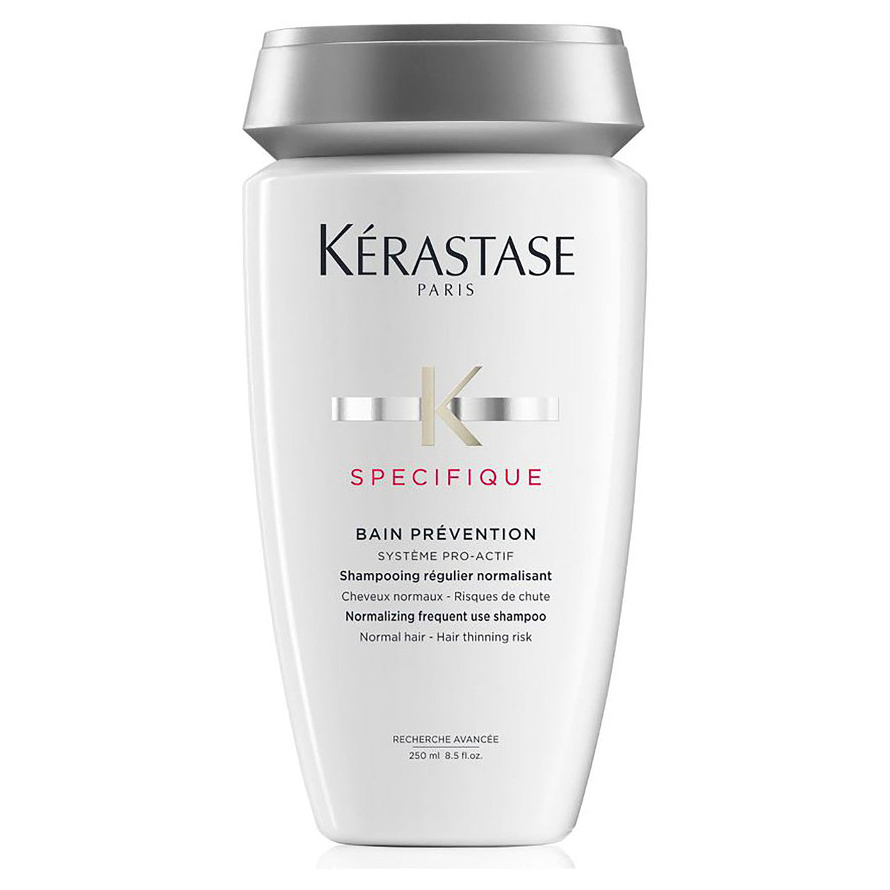 I apologize, but the product description seems to be incomplete or missing some information. The Specifique Bain Prevention 250ml shampoo by Kerastase is packaged in a white bottle designed for normal hair and helps minimize the risk of hair thinning. It features silver accents with descriptions available in both French and English.