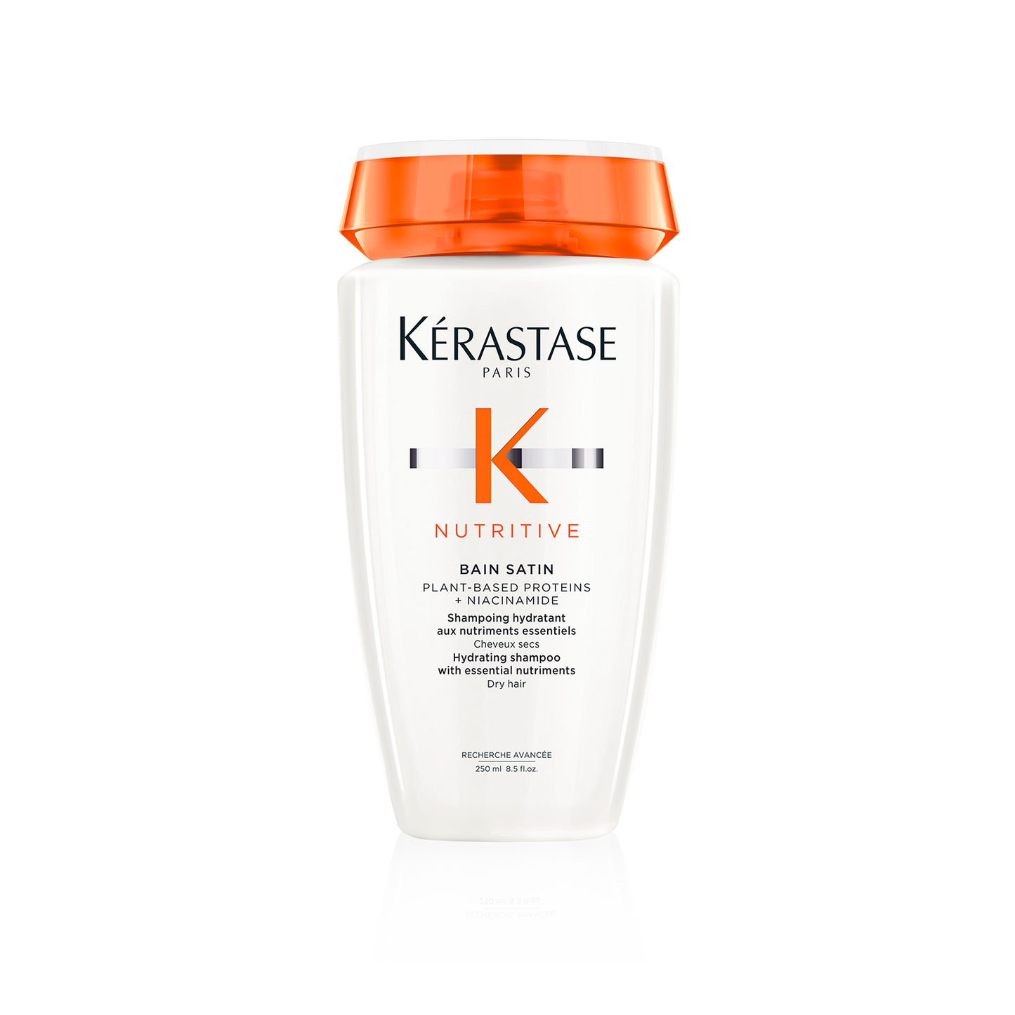 A bottle of Nurtive - Bain Satin Fine to Medium Hair 250ml by Kerestase is a moisturizing shampoo enriched with plant-based proteins designed for dry hair. It features an orange cap and a white label highlighting the nourishing benefits of this nutritive shampoo.