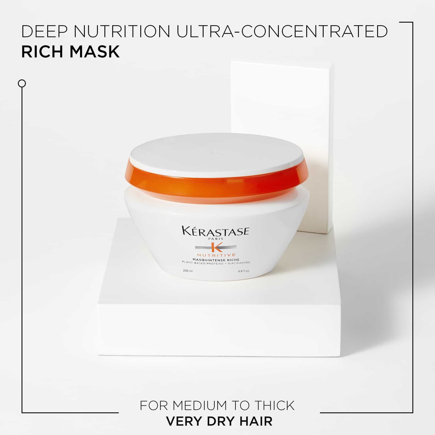 A jar of Kerestase Nutrive Mask Intense Riche Medium to Thick/Dry to Very Dry Hair 200ml is elegantly displayed on a white platform, highlighting its role as an intense hair mask and treatment for very dry hair. It's ideal for nourishing medium to thick strands and features a sleek design with a white base and an orange lid.