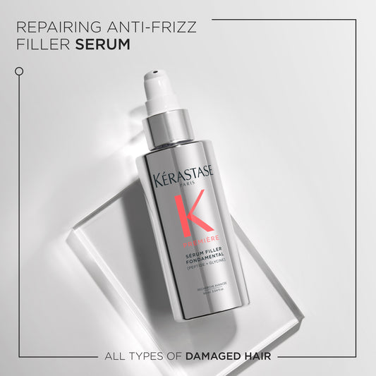 A silver bottle of Mooi Hair's Première Sérum Filler Fondamental 90ml provides repairing anti-frizz protection on a white surface. Featuring a pump dispenser, it's photographed against a minimalistic backdrop with text emphasizing its dual purpose for thermal and damaged hair protection.